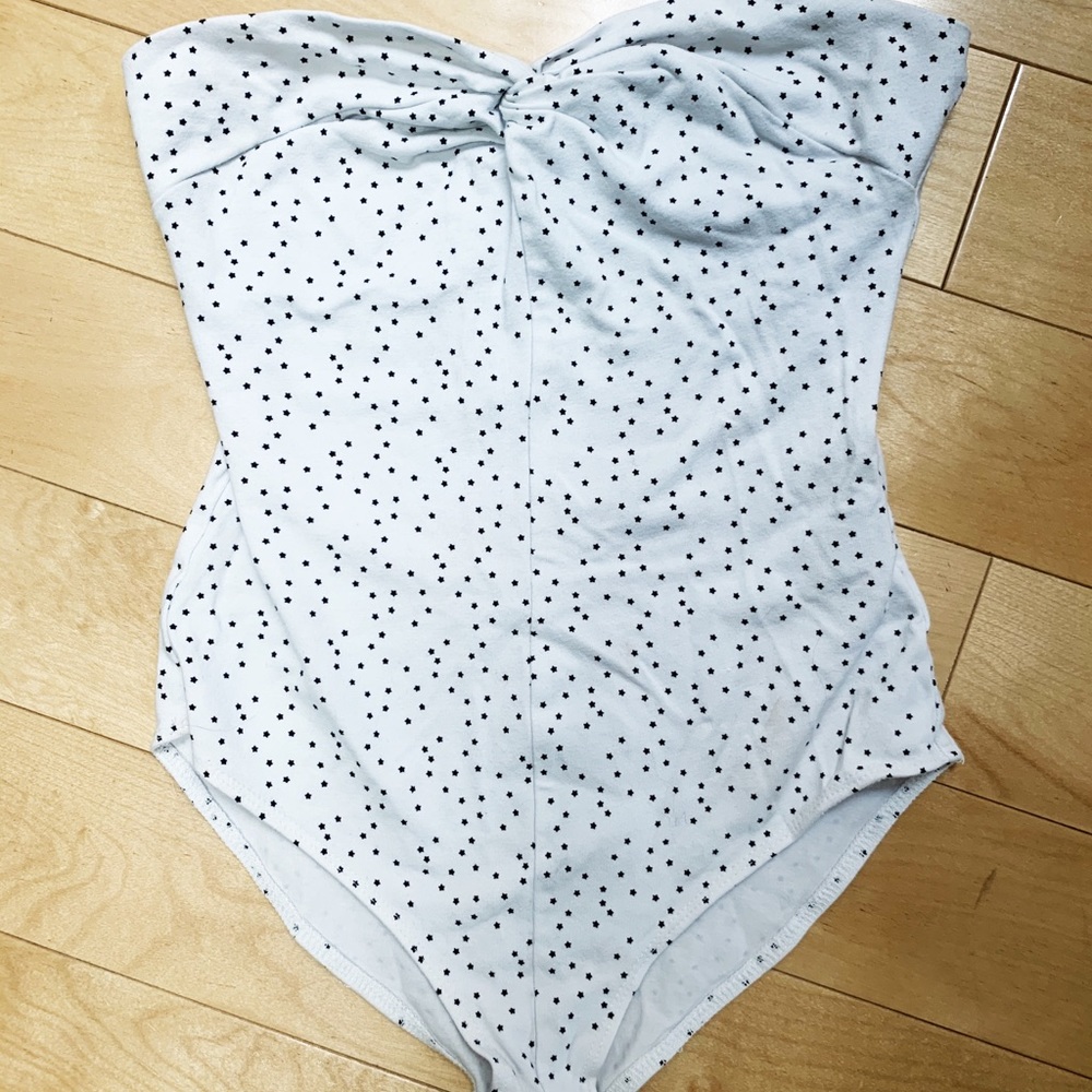 White strapless body suit with black star pattern